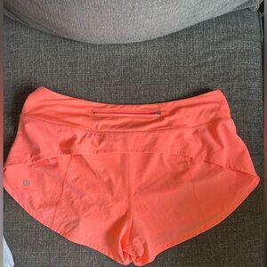 Bright florescent orange speed up 2.5” low rise shorts.  Excellent condition.